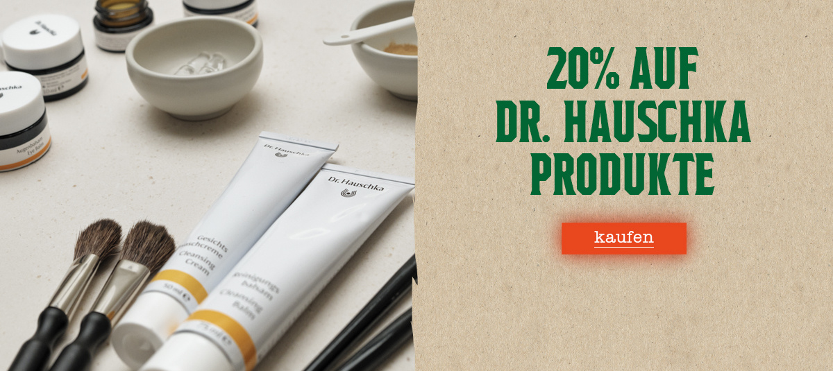 KI generiert: Kosmetikprodukte, Pinsel und Text: "20% auf Dr. Hauschka Produkte kaufen".